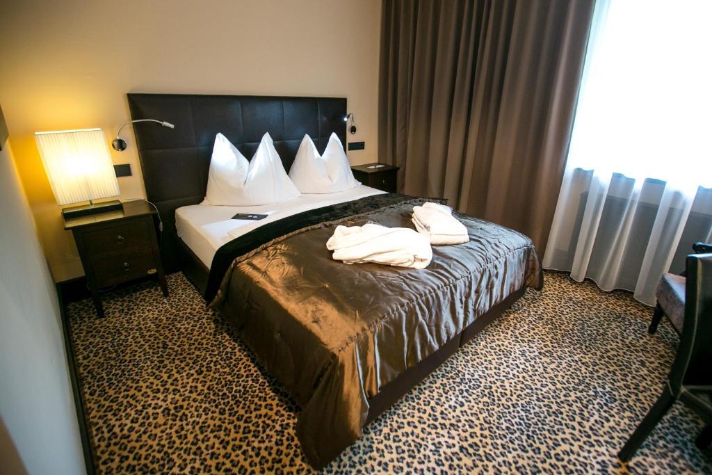 Hotel Seebrunn Am Wallersee เฮนน์ดอร์ฟ อัม วัลลาร์ซี ห้อง รูปภาพ